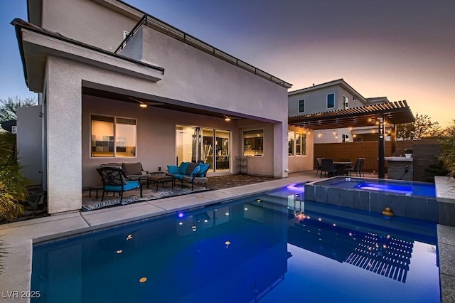 pool at dusk with ceiling fan, a pergola, outdoor lounge area, a patio area, and an in ground hot tub