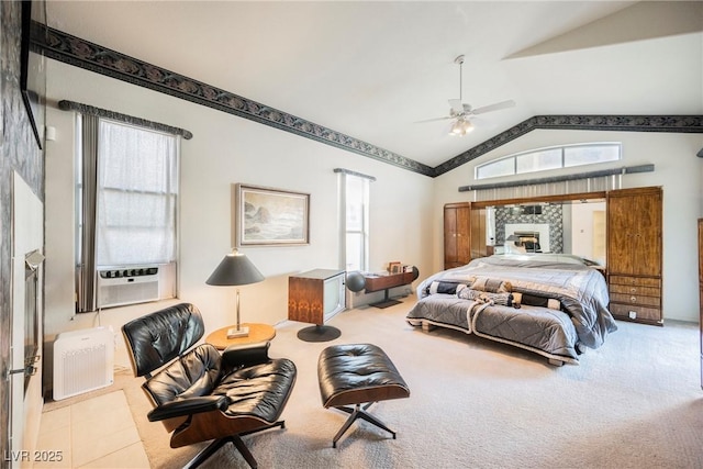 carpeted bedroom featuring cooling unit, ceiling fan, lofted ceiling, and multiple windows