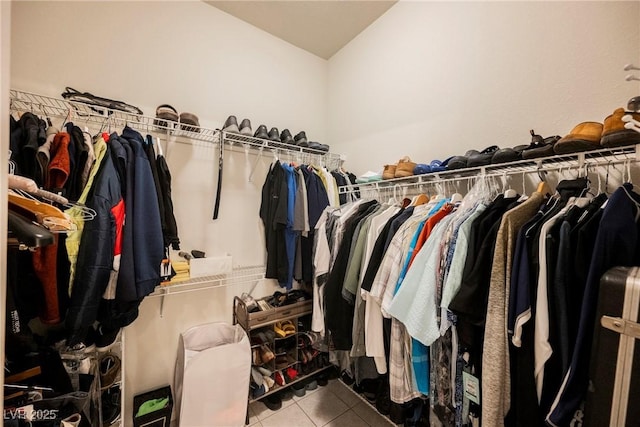 spacious closet with light tile patterned flooring