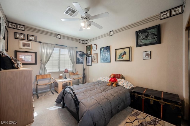 carpeted bedroom with crown molding and ceiling fan