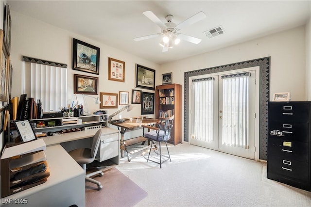 office area featuring french doors, light colored carpet, and ceiling fan