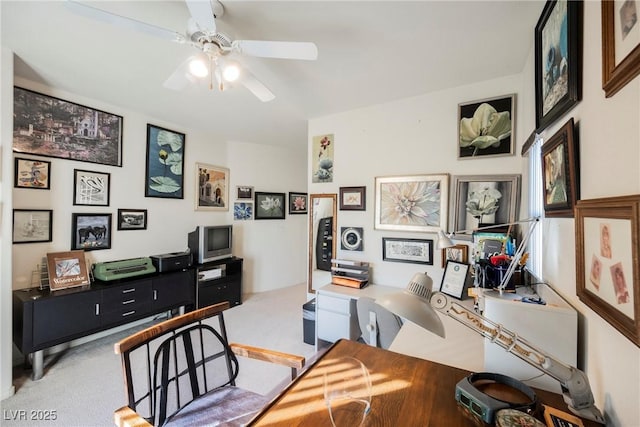 office with light carpet and ceiling fan