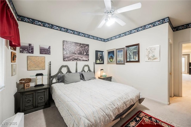 bedroom featuring ceiling fan and carpet flooring