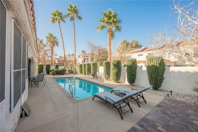 view of pool with a patio area