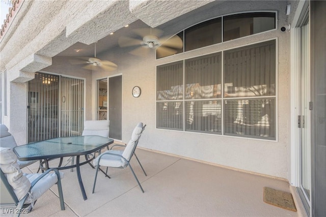 view of patio with ceiling fan