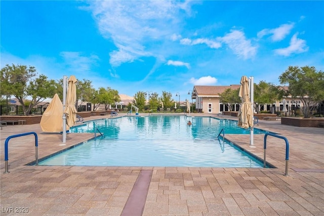 view of pool featuring a patio area