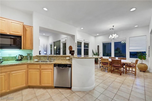 kitchen with sink, black microwave, light tile patterned floors, light brown cabinets, and dishwasher