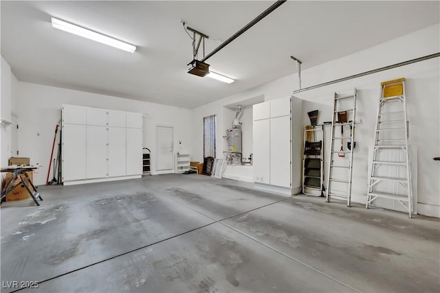 garage featuring a garage door opener and gas water heater