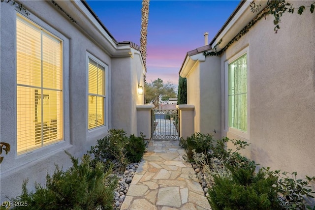 view of property exterior at dusk