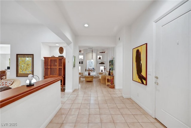 hallway with light tile patterned floors