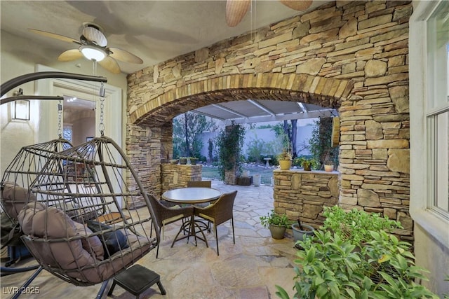 view of patio / terrace with ceiling fan