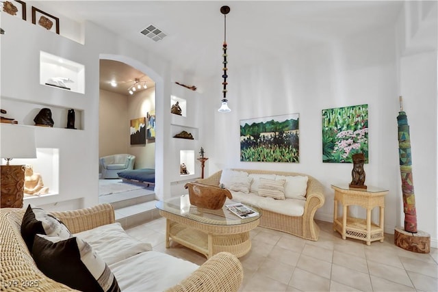 living room with light tile patterned floors