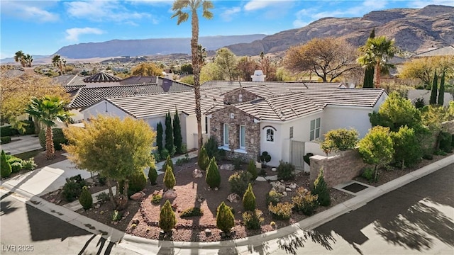 view of front of home with a mountain view