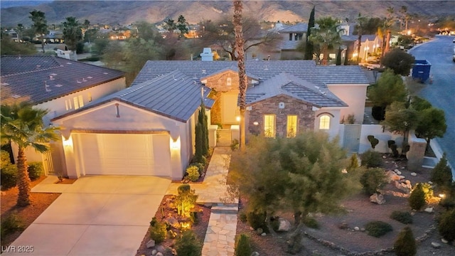 view of front of home with a garage