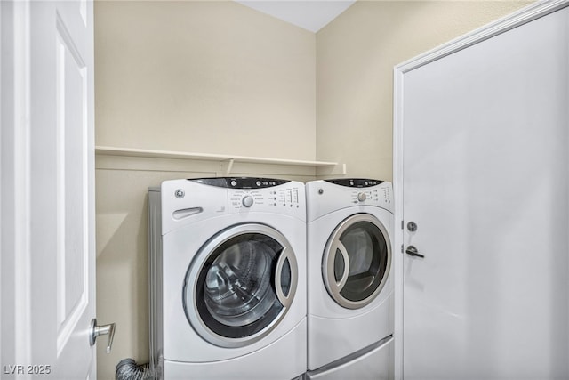 laundry area featuring washer and clothes dryer