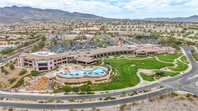 drone / aerial view featuring a mountain view