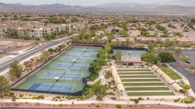 birds eye view of property featuring a mountain view