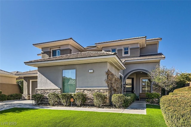 view of front of house featuring a front lawn