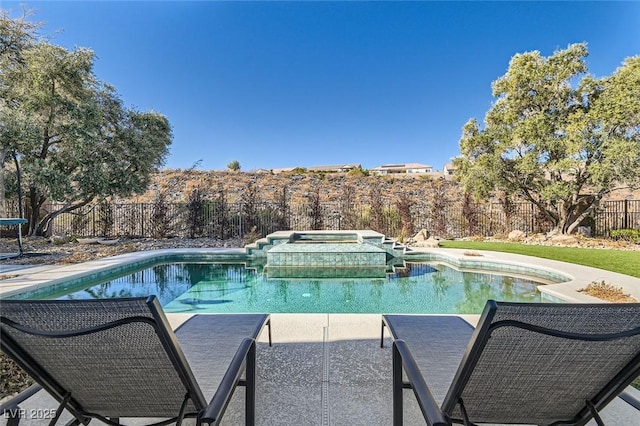 view of pool featuring a jacuzzi