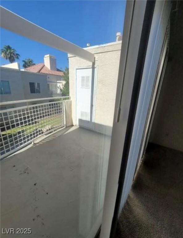 view of patio / terrace with a balcony