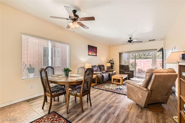 dining room featuring ceiling fan and hardwood / wood-style floors