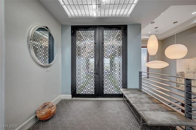 interior space with french doors and carpet flooring