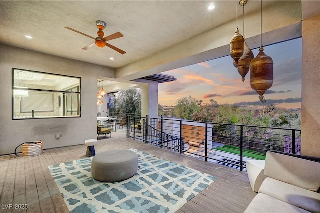 exterior space featuring ceiling fan and outdoor lounge area