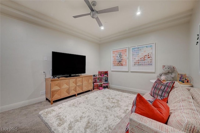 living room featuring carpet and ceiling fan