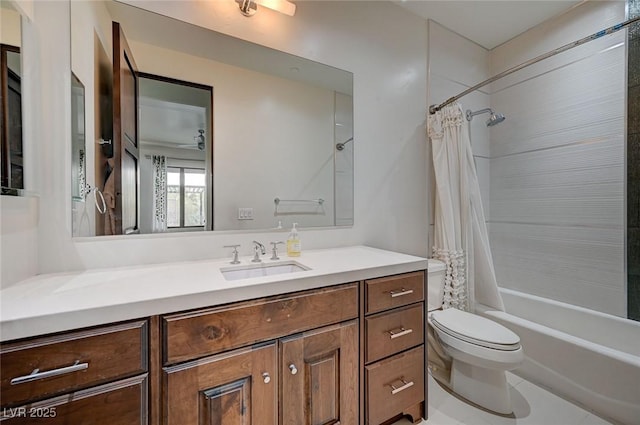 full bathroom with vanity, shower / bath combo with shower curtain, and toilet