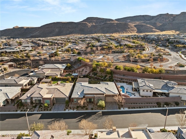 drone / aerial view featuring a mountain view