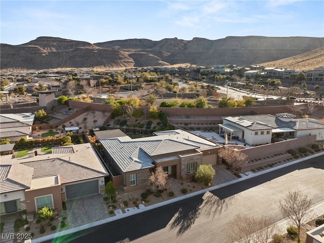 drone / aerial view featuring a mountain view