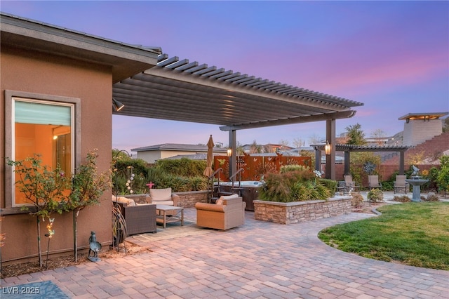 patio terrace at dusk featuring an outdoor hangout area and a pergola