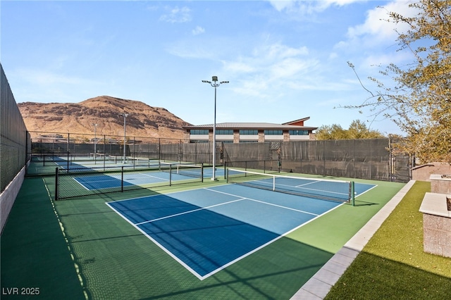 view of sport court featuring a mountain view