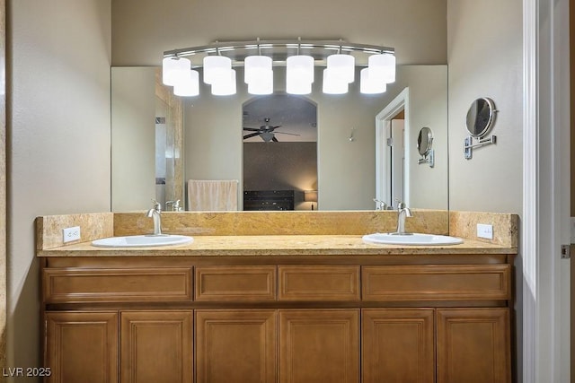 bathroom featuring vanity and ceiling fan