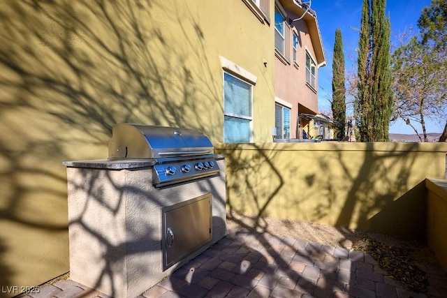 view of patio / terrace featuring a grill and area for grilling