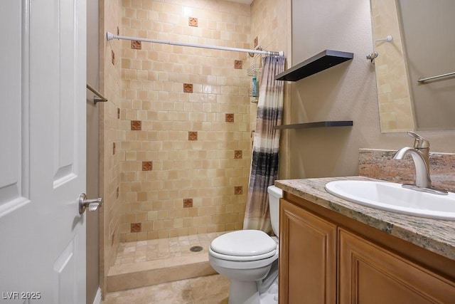 bathroom featuring vanity, toilet, and a shower with curtain