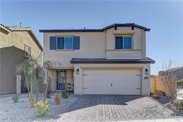 view of front of property featuring a garage