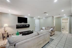 tiled living room with crown molding