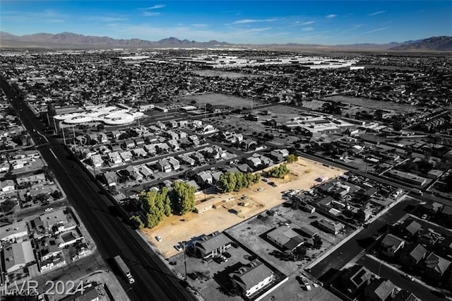 bird's eye view with a mountain view