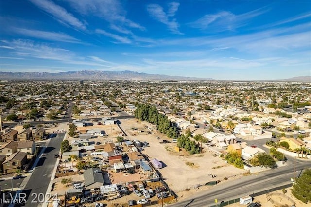 bird's eye view with a residential view and a mountain view