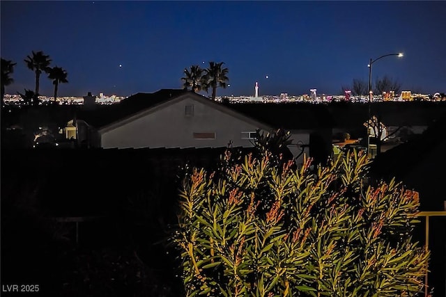 view of property exterior at night