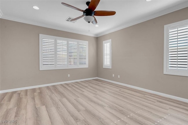 unfurnished room with crown molding, light hardwood / wood-style flooring, and ceiling fan