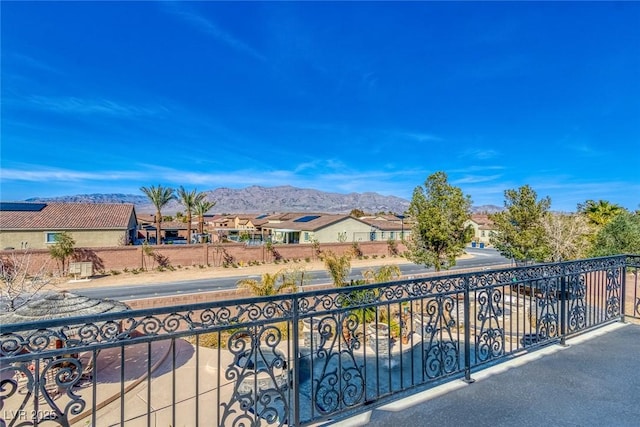 balcony featuring a mountain view