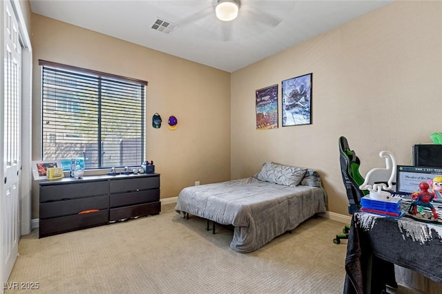 carpeted bedroom featuring ceiling fan