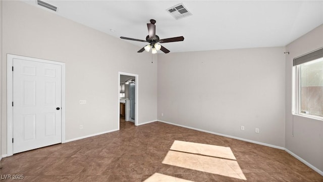 unfurnished bedroom featuring ceiling fan, ensuite bath, and lofted ceiling