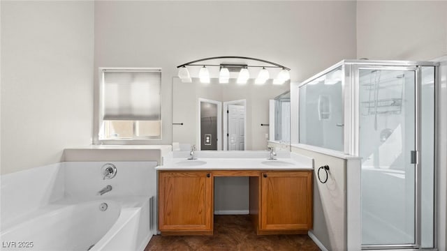 bathroom with vanity and separate shower and tub