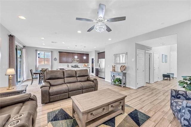 living room with ceiling fan