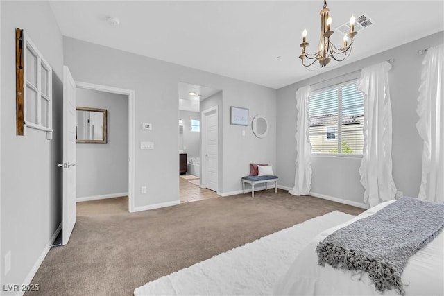 bedroom featuring an inviting chandelier and light colored carpet