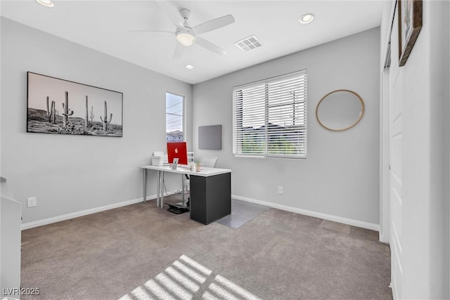 home office with light colored carpet and ceiling fan