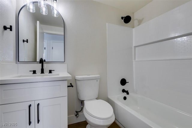 full bathroom with vanity, tub / shower combination, and toilet